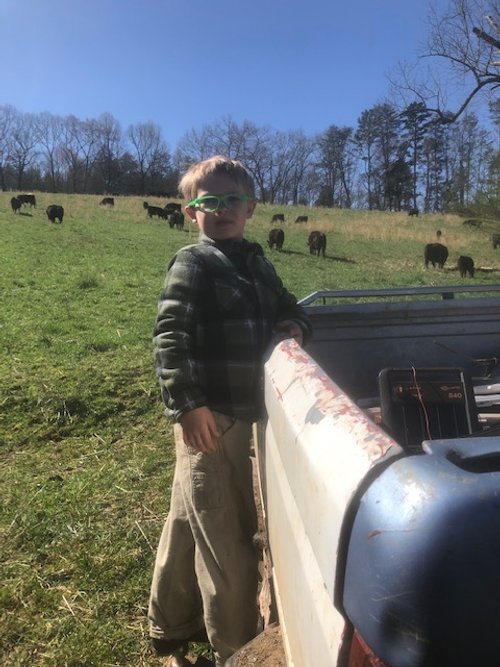 Boy at Cole Creek Farms in Benson, NC